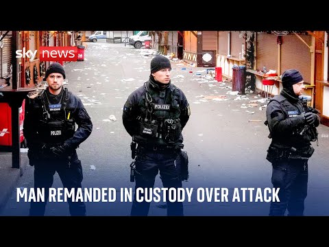 Man held in custody as Christmas market attack victim is named