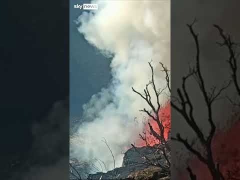 Lava bubbles as volcano erupts in Hawaii