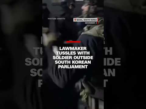 Lawmaker tussles with soldier outside South Korean parliament