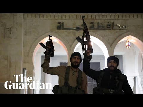 Syrian rebels celebrate capture of Hama from Assad regime forces