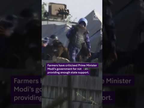 Police fire tear gas at Indian farmers