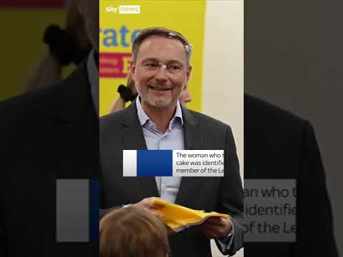 Politician slapped with cake in face