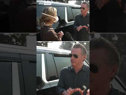 Moment woman confronts California governor