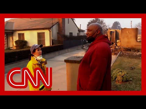 In fire-ravaged neighborhood, see home that was ‘touched by God’