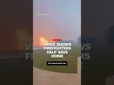 Video shows firefighters help save home