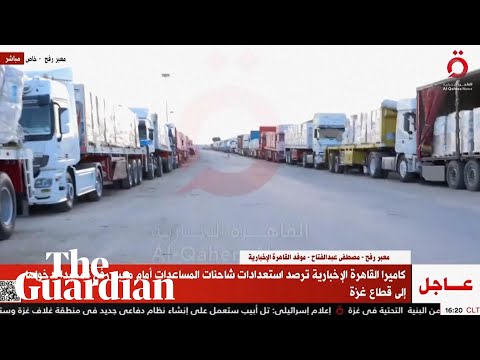 Aid lorries line up at the Rafah border in preparation to cross into Gaza