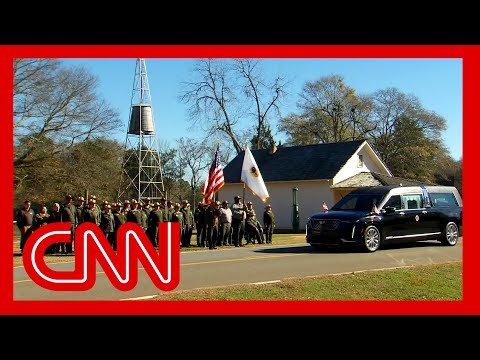 Jimmy Carter’s motorcade passes his boyhood home for the last time