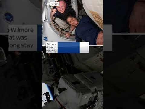 Stuck astronauts take first spacewalk together
