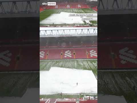 Snow cleared from Anfield pitch
