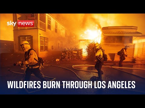 Live: 30,000 people flee exclusive LA suburbs as wildfires rip through the area