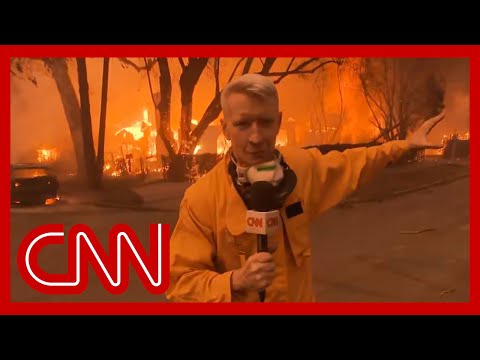 ‘Uncomfortably close’: Anderson Cooper reports from California neighborhood hit by wildfire
