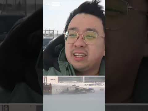Plane flips on runway