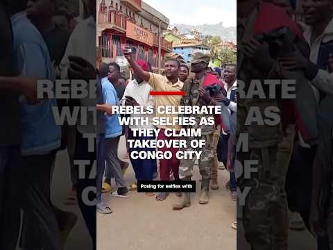 Rebels celebrate with selfies as they claim takeover of Congo city 