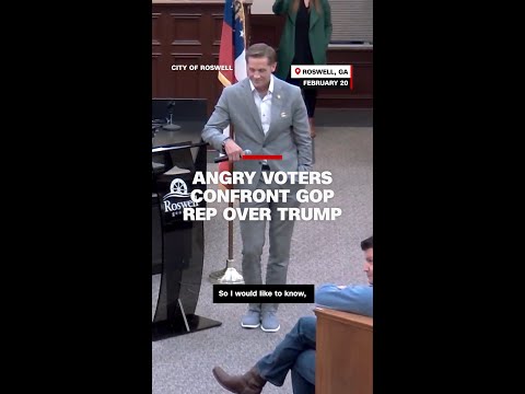 Angry voters confront GOP representative over Trump