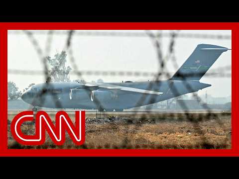 Indian migrants seen in shackles as they board deportation flight from US