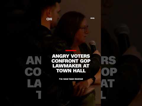 Voters confront GOP lawmaker over Trump’s moves at tense town hall