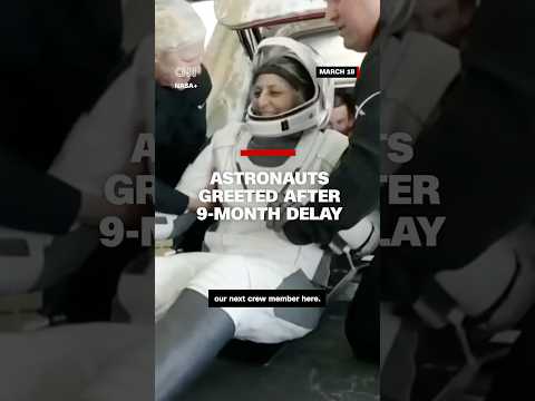 Astronauts greeted after 9-month delay