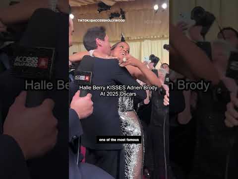 Halle Berry kisses Adrien Brody on Oscars red carpet