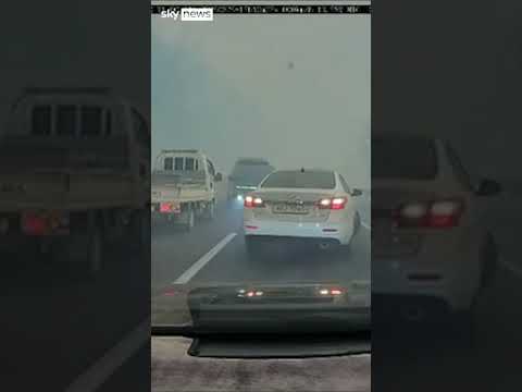 Drivers navigate thick wildfire smoke