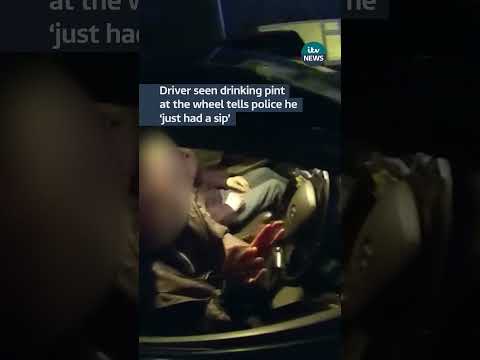 Driver seen drinking pint at the wheel tells police he ‘just had a sip’ | ITV News