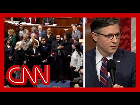 See moment Democrats sing and defy Johnson on House floor