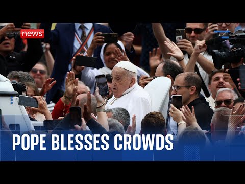 Pope blesses Easter crowds from popemobile in first significant appearance since illness
