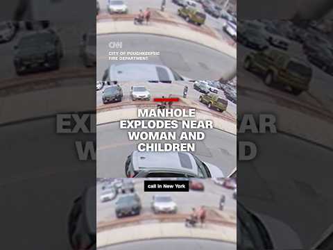 Manhole explodes near woman and children