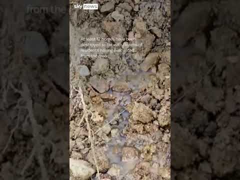 Residents evacuate following landslides