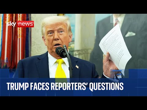 Trump faces reporters in the White House Oval Office