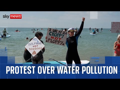 Thousands across the UK take to the water in ‘paddle-out’ protest against water pollution