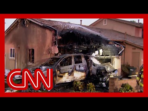 Business jet crashes into San Diego neighborhood, setting homes and cars on fire