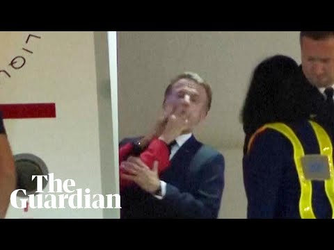Moment Macron’s wife pushed him in the face as they land in Vietnam