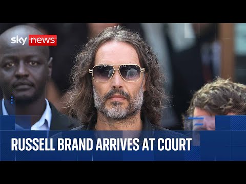 Russell Brand arrives at court for plea hearing