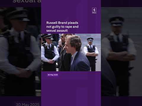 Russell Brands pleads not guilty to rape