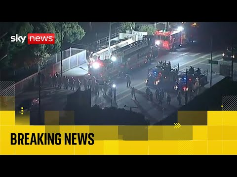 National Guard troops clash with protesters in Los Angeles