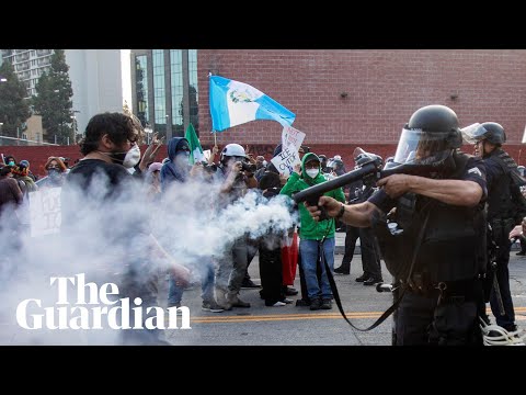 Protesters dispersed with ‘less lethal rounds’ outside the federal building in LA