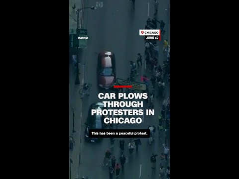 Car plows through protesters in Chicago