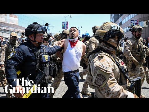 Law enforcement officials announce criminal charges over protests – watch live