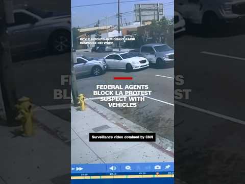 Federal agents block LA protest suspect with vehicles