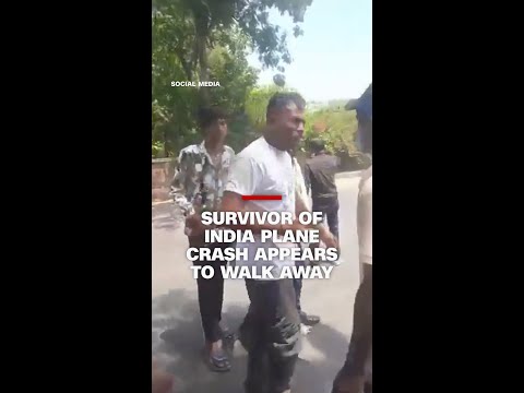 Survivor of India plane crash appears to walk away from site in video