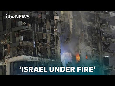 ‘All of Israel is under fire’: Blasts and smoke as Iran launches hundreds of missiles | ITV NEWS