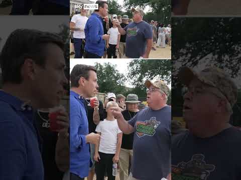 Sky correspondent in confrontation with heckler