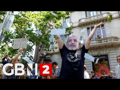 Barcelona locals take to the streets in protest against mass tourism