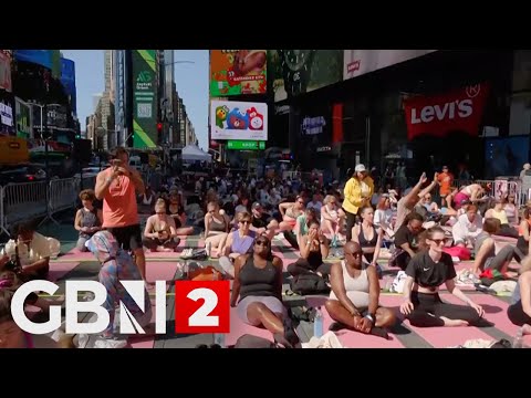 WATCH: Yogis practice their craft in New York’s Time Square