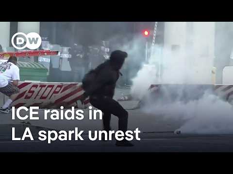 Los Angeles riot police fire ‘flash-bang’ rounds at protesters after violent immigration raids