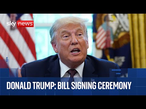 Donald Trump participates in a bill signing ceremony