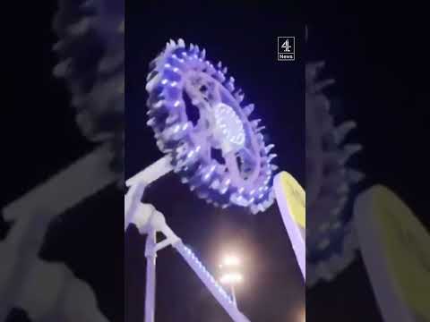 Fairground ride snaps mid-air