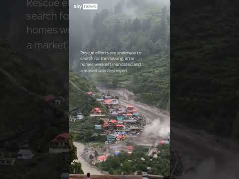 Moment flash flood crashes through Indian village