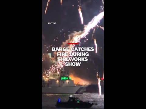 Japanese firework festival ends with barges on fire