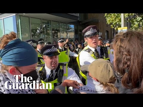 Scuffles between protesters and police at London arms fair